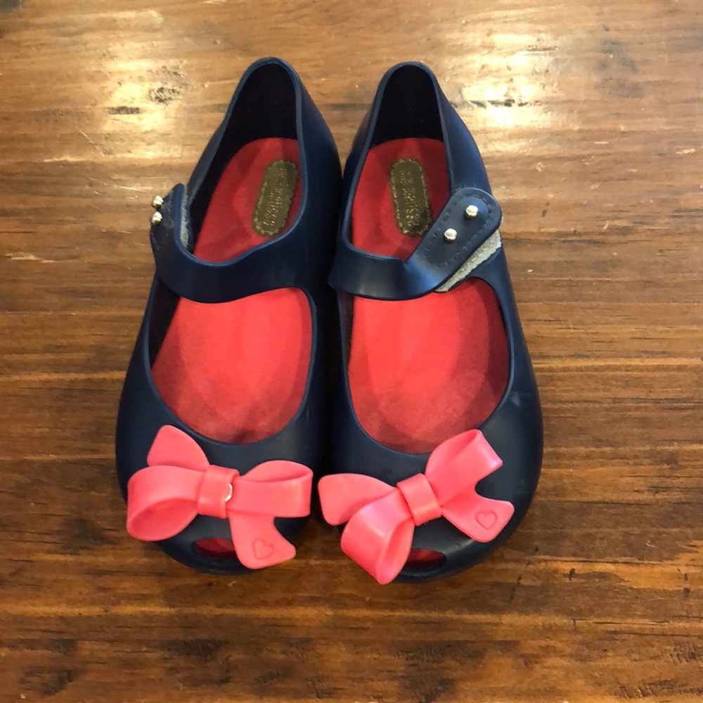 Kids Mini Melissa navy shoes with pink bow. Size 9
